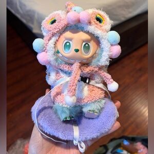 Collectible Plush Figure with Pastel Outfit and Car Seat Set
